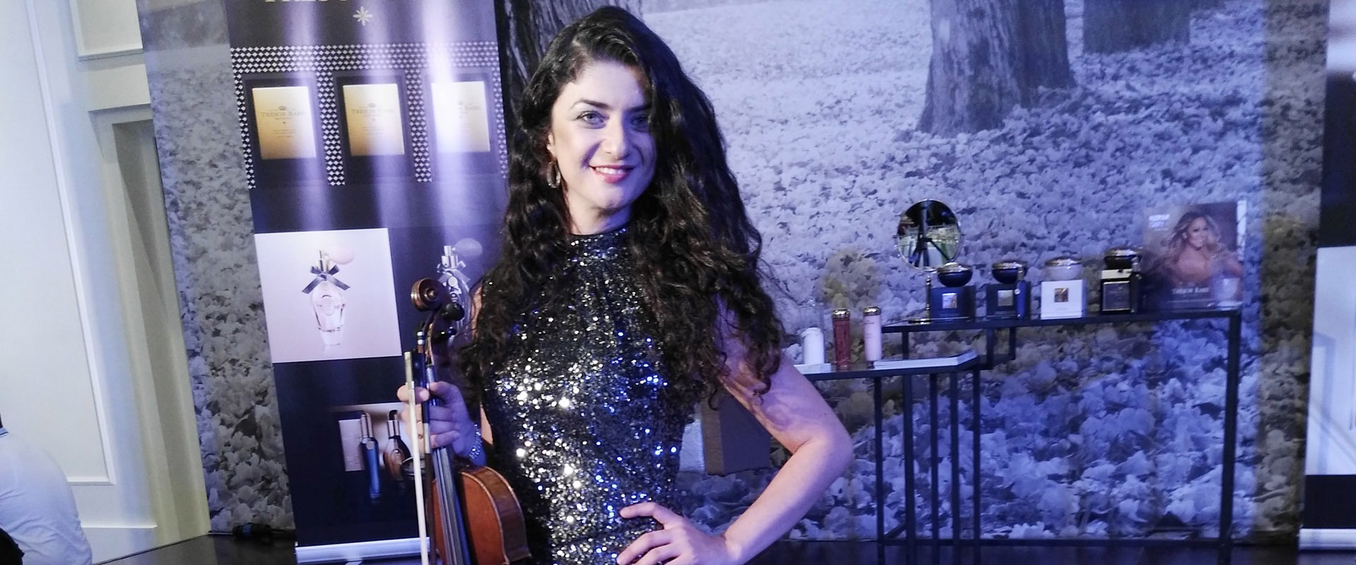 Corporate event violinist Dubai — Anna Petrasian at Forbes event