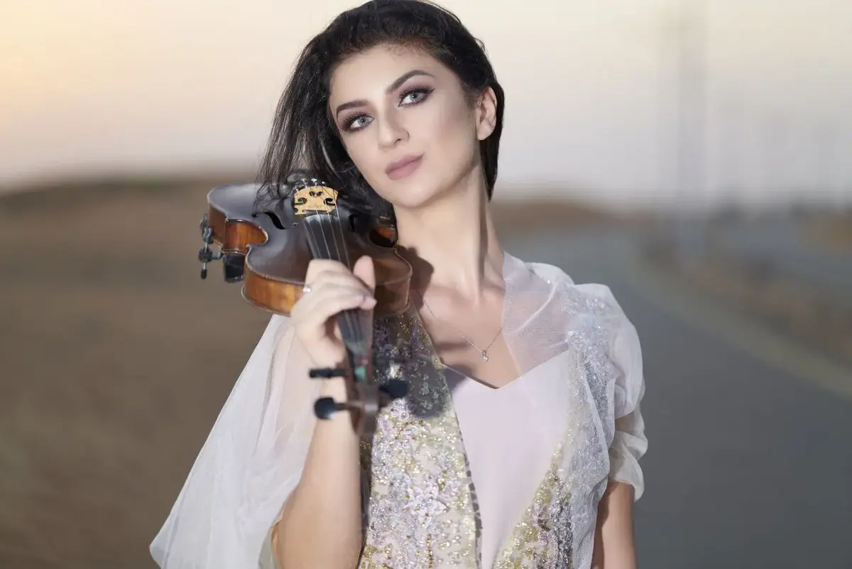 Anna Petrasian desert sunset photoshoot with violin